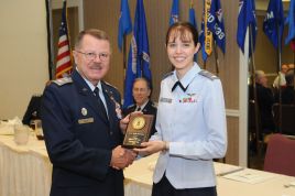 Lt Harrison received award from Col Weiss